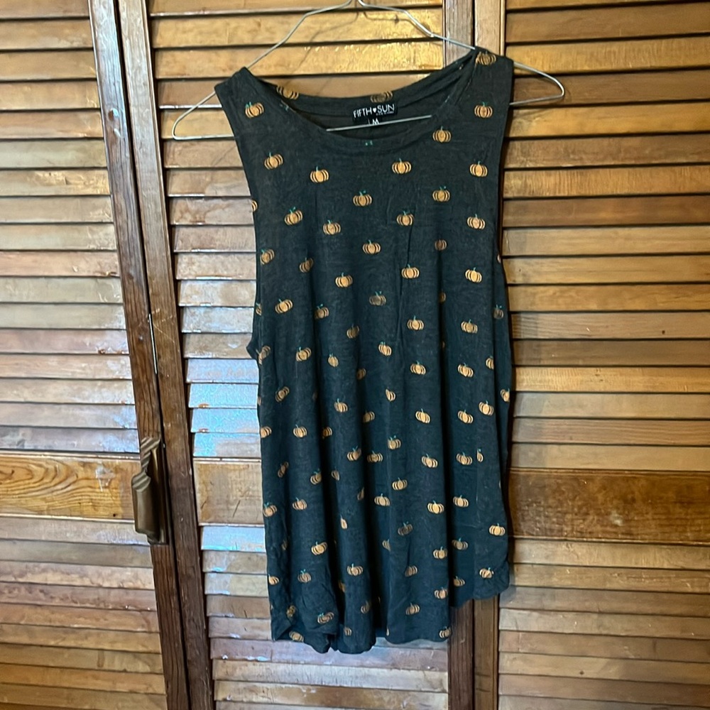 Pumpkin tank top. High neck size medium fifth sun.